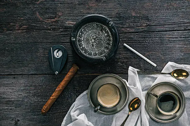 Photo of Still life with coffee cups and ashtray