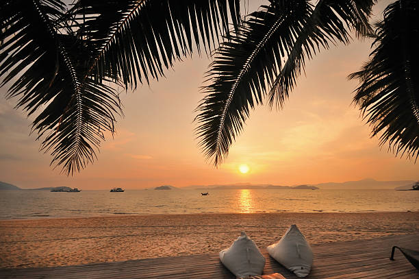 istock Sunrise on tropical beach background 614040460