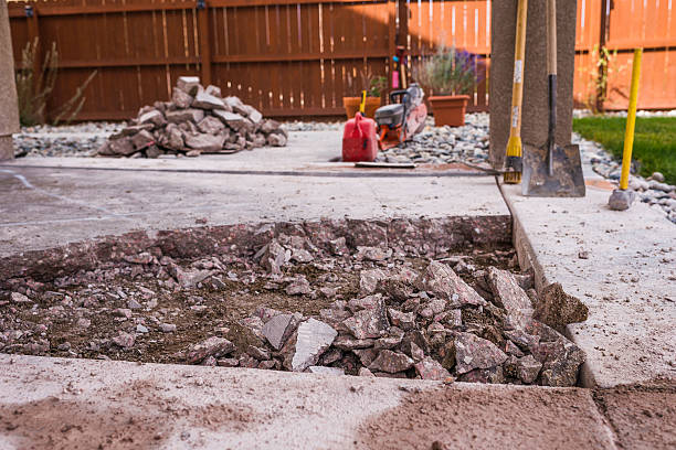 istock Partially removed concrete patio. Home construction and renovation 614040894