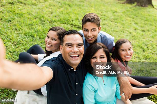 Happy Latin Familly Taking A Selfie Outdoors Stock Photo - Download Image Now - Family, Teenager, Latin American and Hispanic Ethnicity