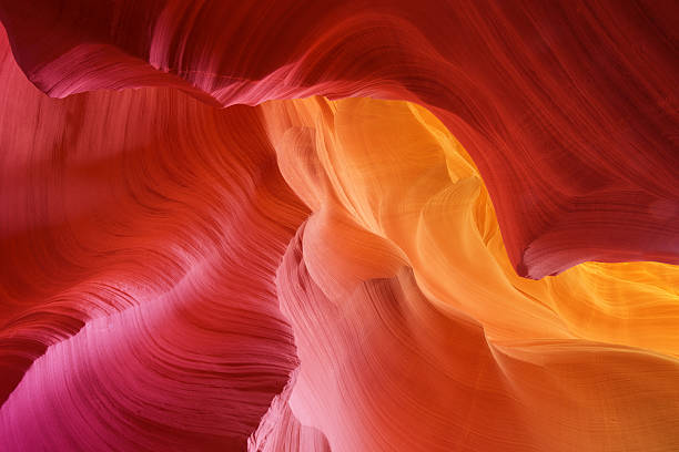 color hues of stone in antelope canyon - red yellow imagens e fotografias de stock