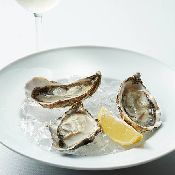 opened oyster on dish