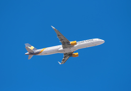 Tenerife, Spain - January 15, 2016: Thomas Cook Airbus 321 is taking off from Tenerife South airport on January 15, 2016.Thomas Cook Airlines, is a British charter airline based in Manchester, England.o