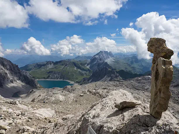 View from a mountain peak on Lünersee lake in the Austrian Alps