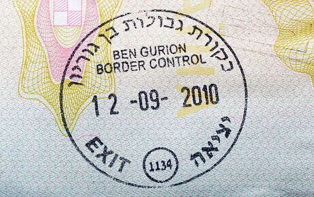 istock Israel visa stamp in passport 614044006