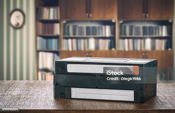 Vhs Videotapes Stock Photo - Download Image Now - Bookshelf, Videocassette, Audio Cassette