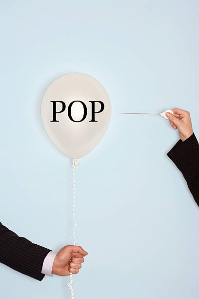 istock Popping balloon with text saying POP 614045844