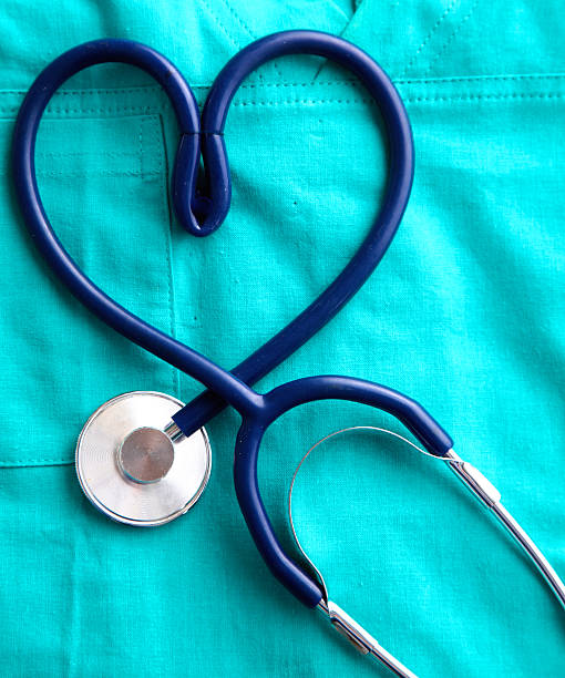 istock Stethoscope on a background of medical coat 614047150