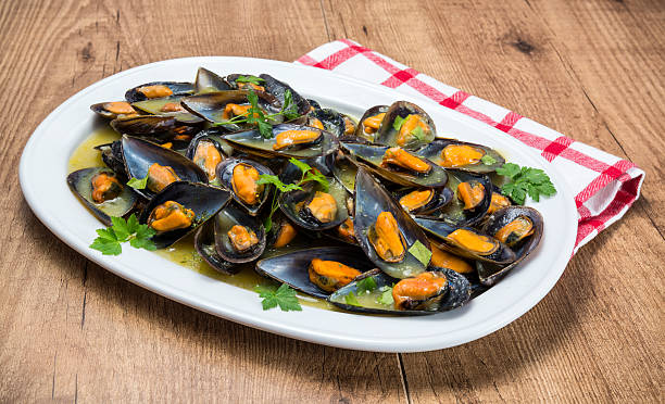 istock Mussels in marinara sauce,spanish cuisine 614051504