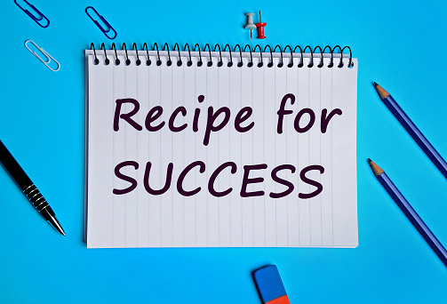 Recipe for success words on notebook page