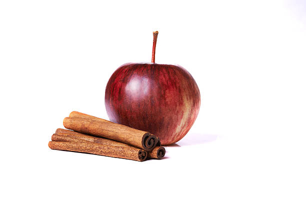 Pomme rouge et les bâtons de cannelle - Photo