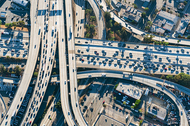 istock Aerial view of a freeway intersection in Los Angeles 614106404