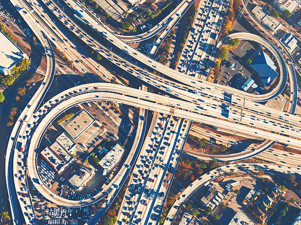 istock Aerial view of a freeway intersection in Los Angeles 614106430