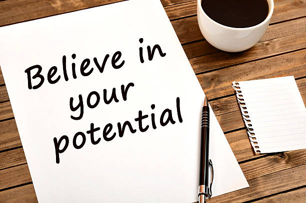 istock Text Believe in your potential on paper 614107230