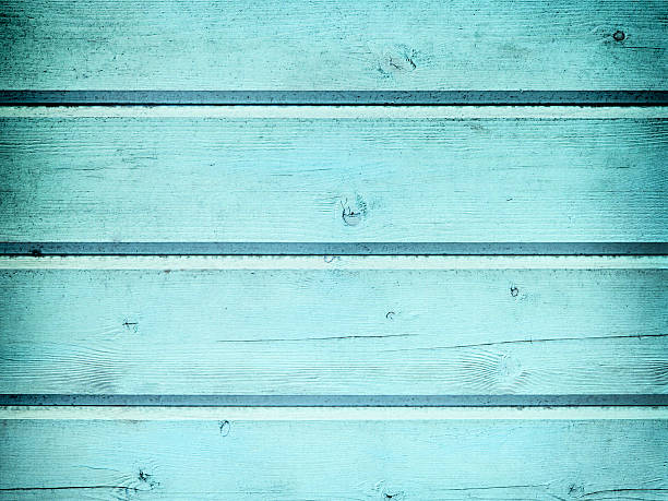 istock Rustic old plank background in turquoise, mint and white colors 614114198