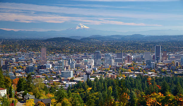 Portland Oregon in autumn Portland Oregon in fall. A freshly snow covered Mt hood in the background mt hood photos stock pictures, royalty-free photos & images