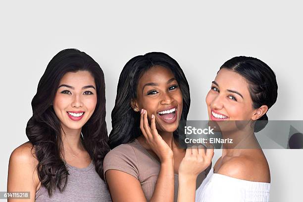 Mixed Race Multiethnic Female Friends Laughing Together Perfect Smile Stock Photo - Download Image Now