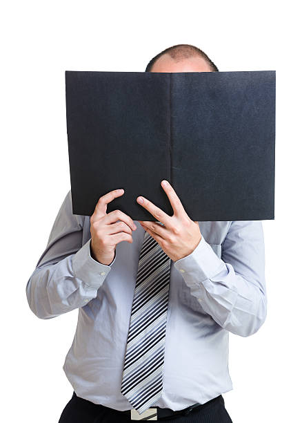istock Asian businessman holding a file 614116050