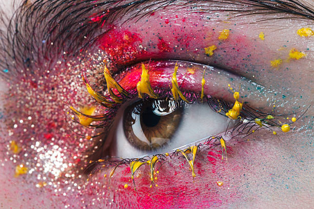 close-up studio shot of woman eye - human eye eyesight women creativity imagens e fotografias de stock