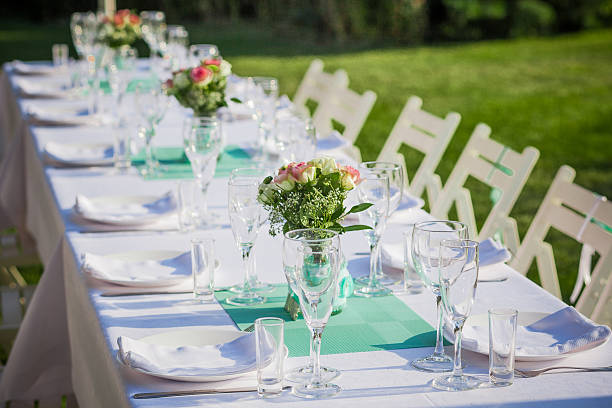 Table wedding reception Table set for an event party or wedding reception formal dinning stock pictures, royalty-free photos & images