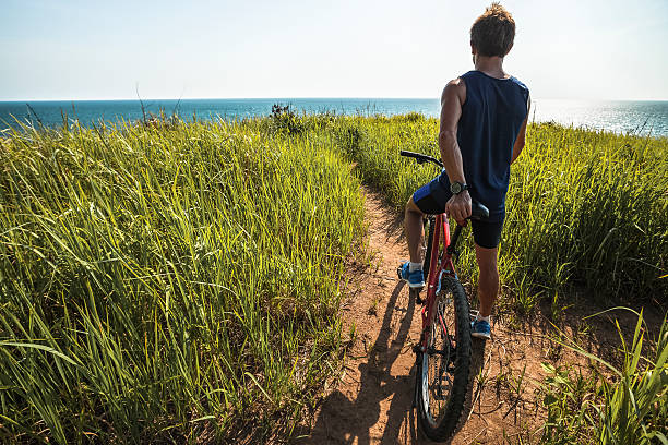 istock Young rider with a bike 614119704