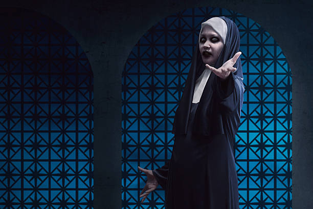 istock Scary asian nun lend hand on 614121602