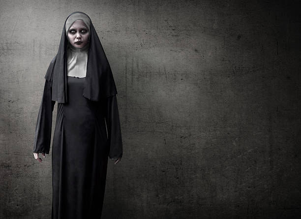 Scary Devil Nun Scary devil nun for halloween concept image nun catholicism sister praying stock pictures, royalty-free photos & images