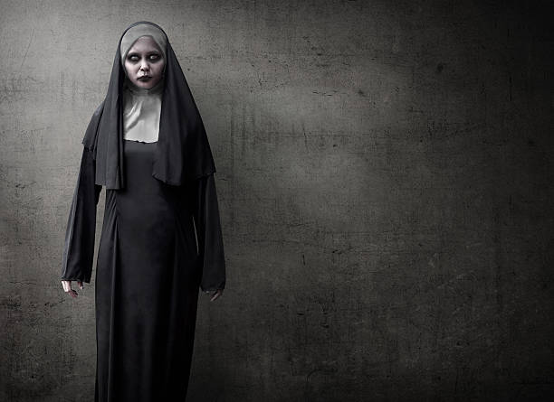 Scary Devil Nun Scary devil nun for halloween concept image angry nun stock pictures, royalty-free photos & images