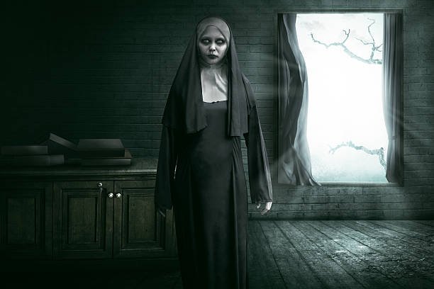 Scary Devil Nun Scary devil nun for halloween concept image angry nun stock pictures, royalty-free photos & images