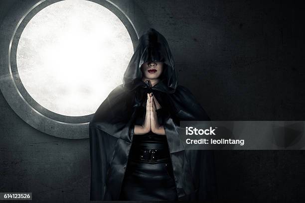 Witch Wearing Black Hood Stock Photo - Download Image Now - Hood - Clothing, Hooded Shirt, Ceremonial Robe