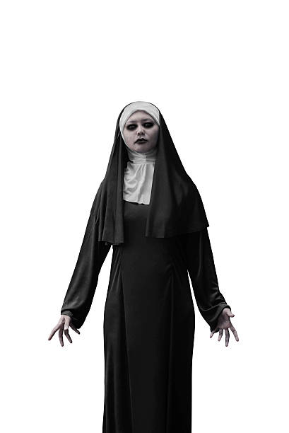 Evil nun expressions Evil nun expressions isolated over white background angry nun stock pictures, royalty-free photos & images