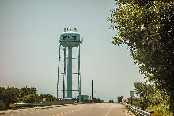 istock oak island bridge and water tower 614125398