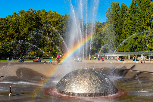 Seattle, United States - September 10, 2016: The International Fountain in Seattle Center, built for the 1962 World's Fair, delights children and adults as the water syncs with music.