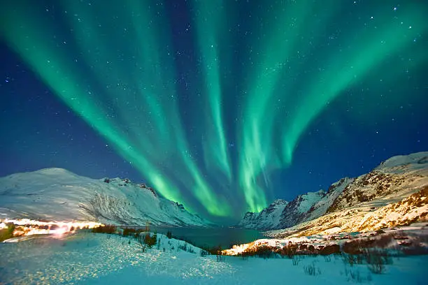 Aurora Borealis in Ersfjordbotn, Tromso Norway during winter season.