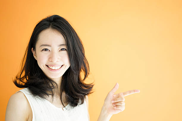 Woman pointing stock photo