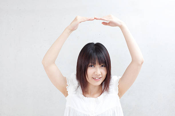 istock Woman in a ballerina pose 614129728