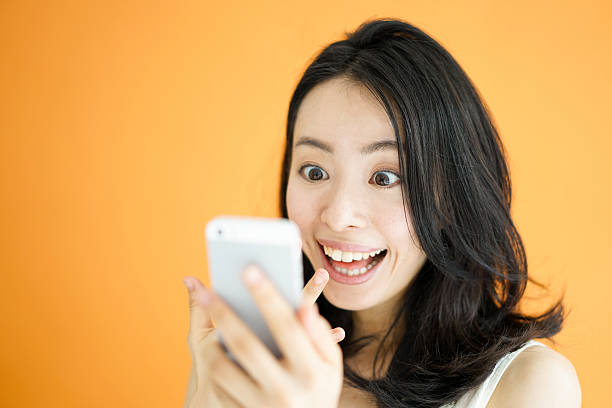 Woman using smartphone stock photo