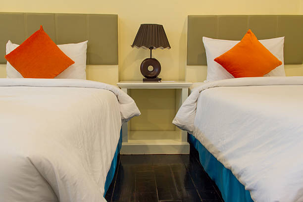 istock interior of hotel room - two bed room 614132372