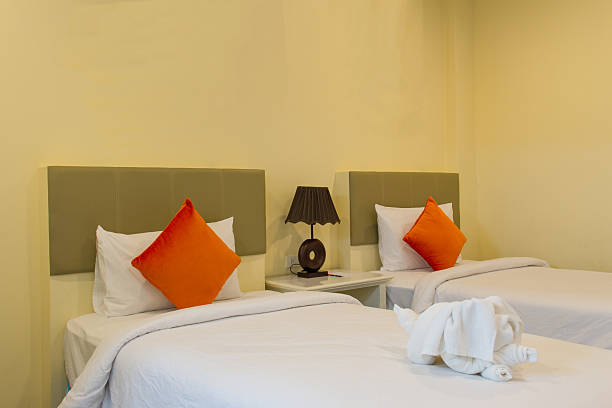 istock interior of hotel room - two bed room 614132740