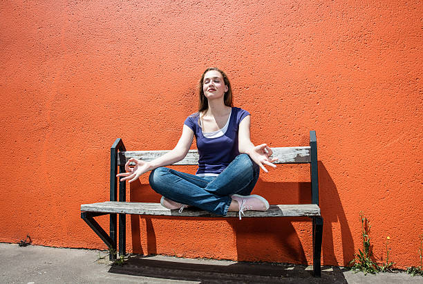 istock relaxing beautiful female student breathing in between college e 614133076