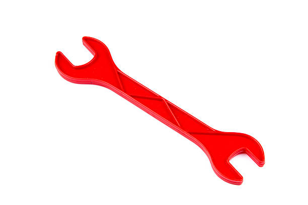 istock Children's toy tool plastic color wrench isolated on white backg 614133546