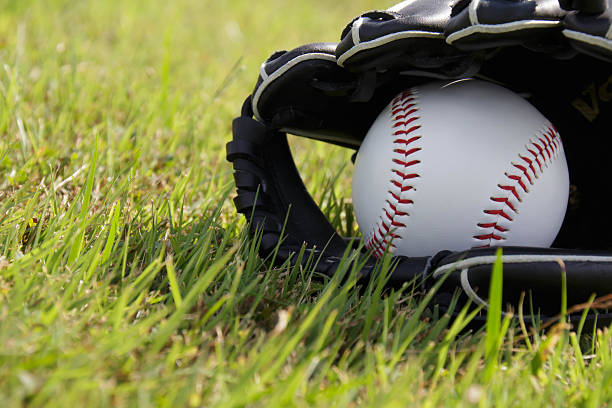 istock Baseball ball and glove 614134220