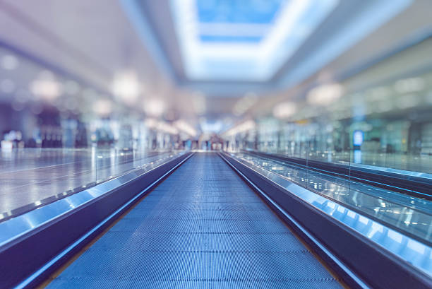 istock Moving Walkway At Airport 614136434
