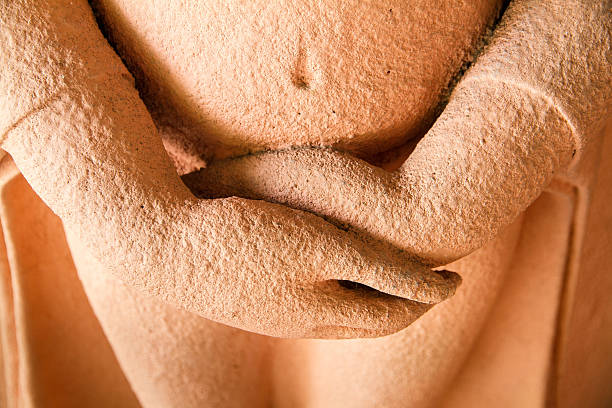 istock Sandstone Buddha statue in Thailand. 614137364
