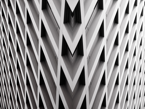 Modern office building with angular / rhombus structure of cells. Reworked abstract architecture photo. Realistic though unreal architectural object.