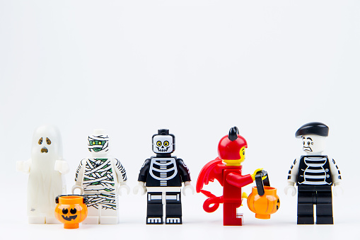 Nonthabure, Thailand - September 24, 2016: Lego ghost halloween want halloween candy Trick or Treat with Lego pantomim.Theme Halloween background.