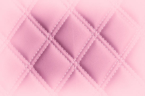 istock Texture of pink leather, seam, close-up 614139784