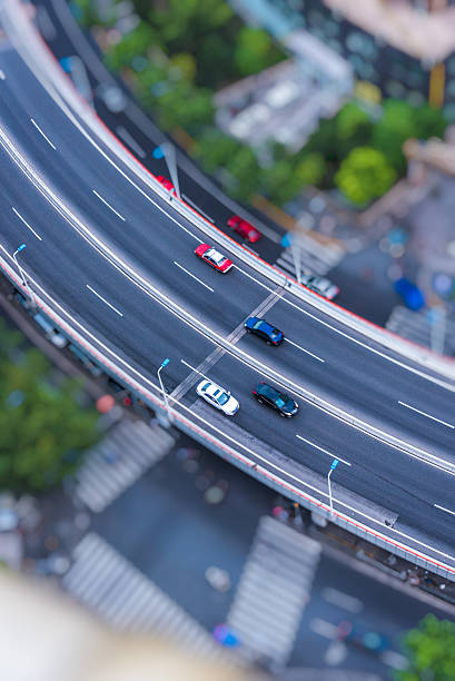 istock urban traffic with cityscape 614139920