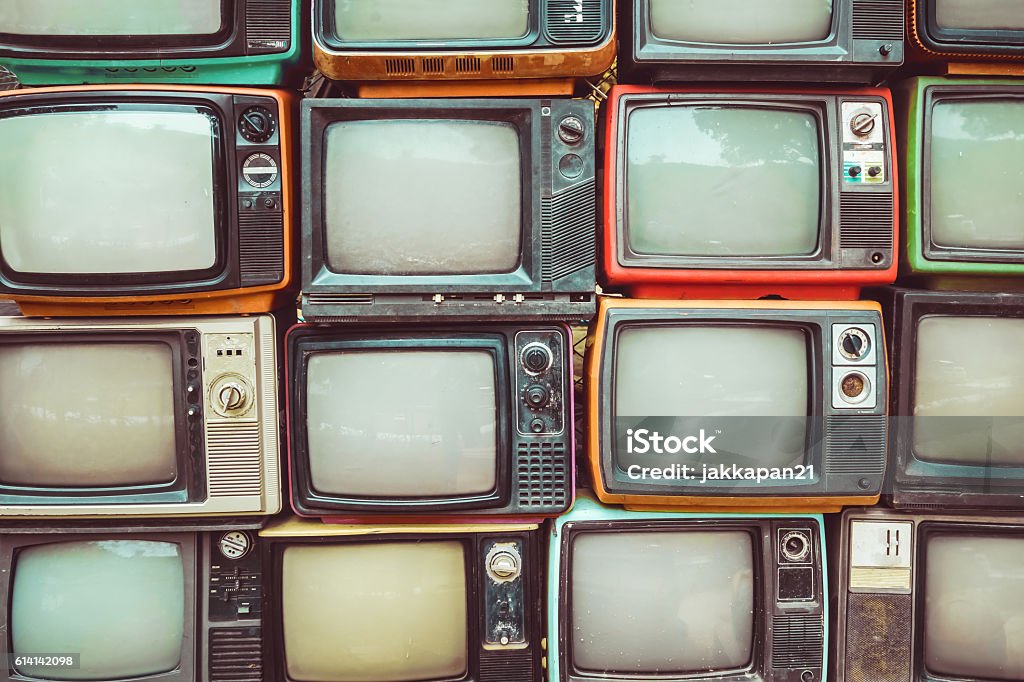 retro tv Pattern wall of pile colorful retro television (TV) - vintage filter effect style. Television Set Stock Photo