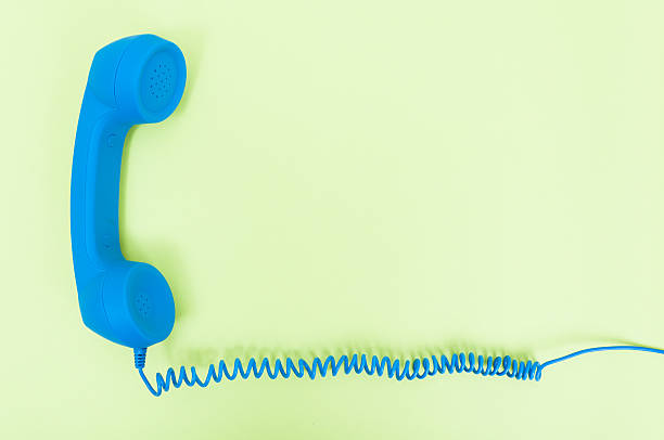istock Retro telephone receiver with cord 614144050